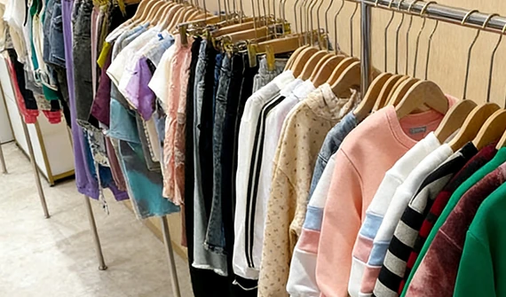 Children's sample garments on a clothing rail
